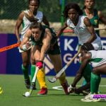 A South African player going past 3 Nigerian defenders in their game earlier today